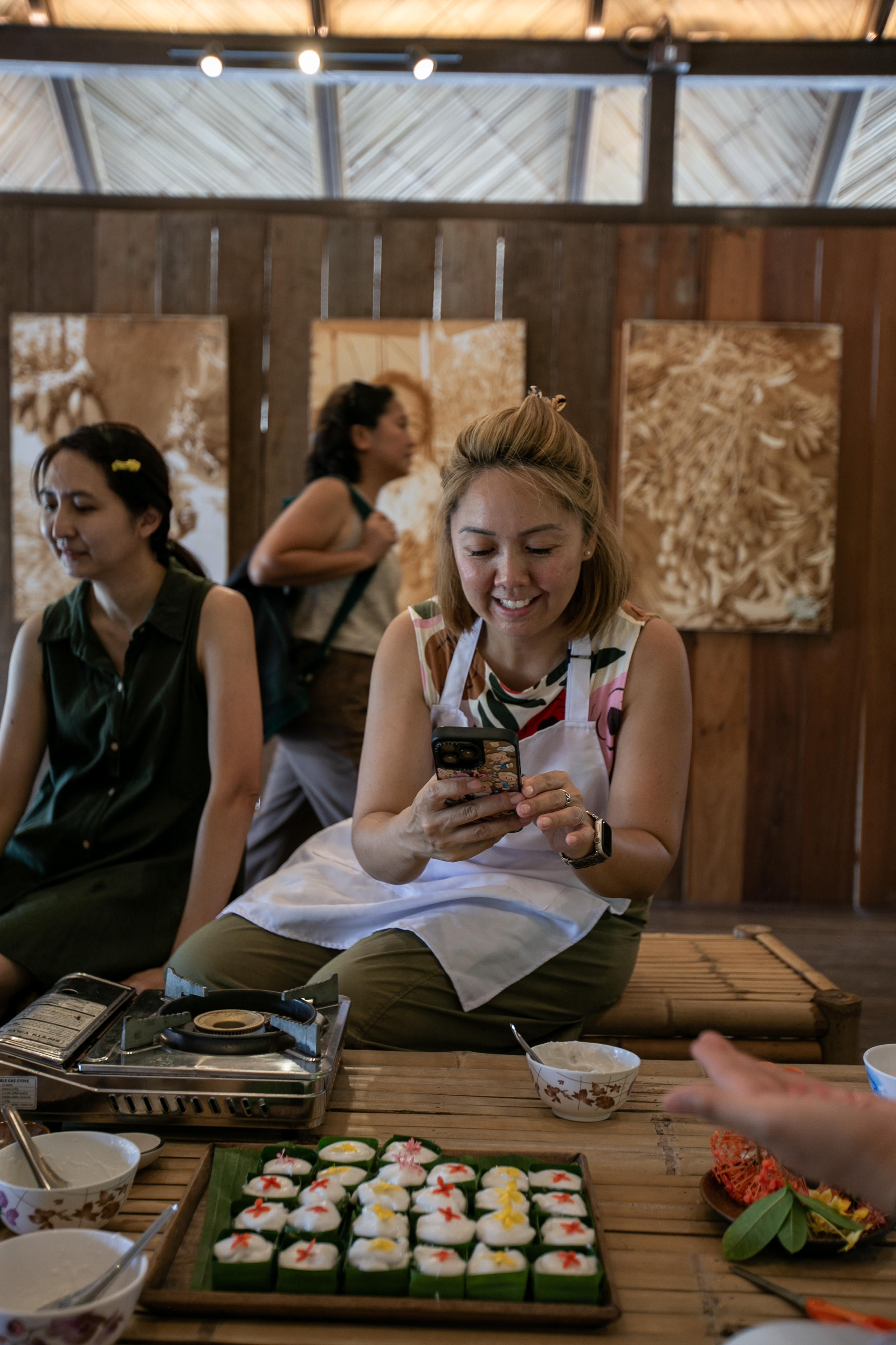 A group of guests showing off their handmade look choup skewers after the workshop.