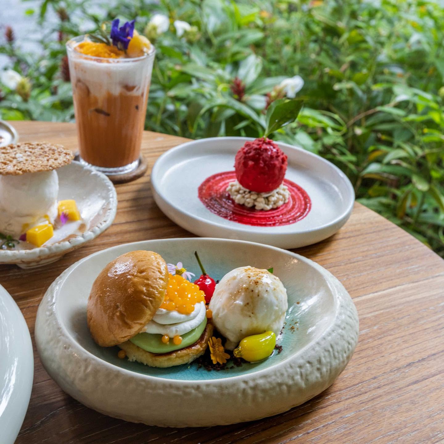 Thai iced tea and desserts including mango sticky rice and a butterfly pea flower ice cream at Natura Caf&eacute;.